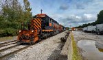 WE 6353 leads the power for the stone train toward Summit St.